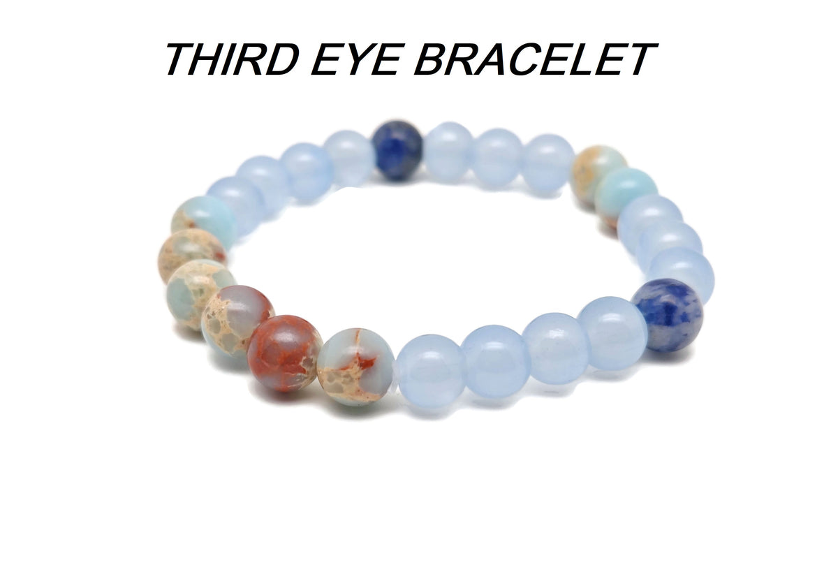 Handmade GemstoneGO intention bracelet with colorful crystals on a stretchy band, suitable for men and women.