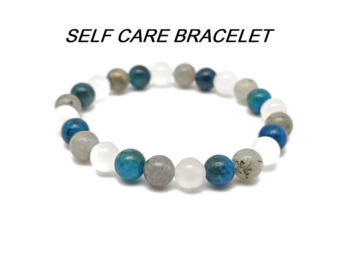 Handmade GemstoneGO intention bracelet with colorful crystals, stretchy design for men and women, customizable for positive energy.