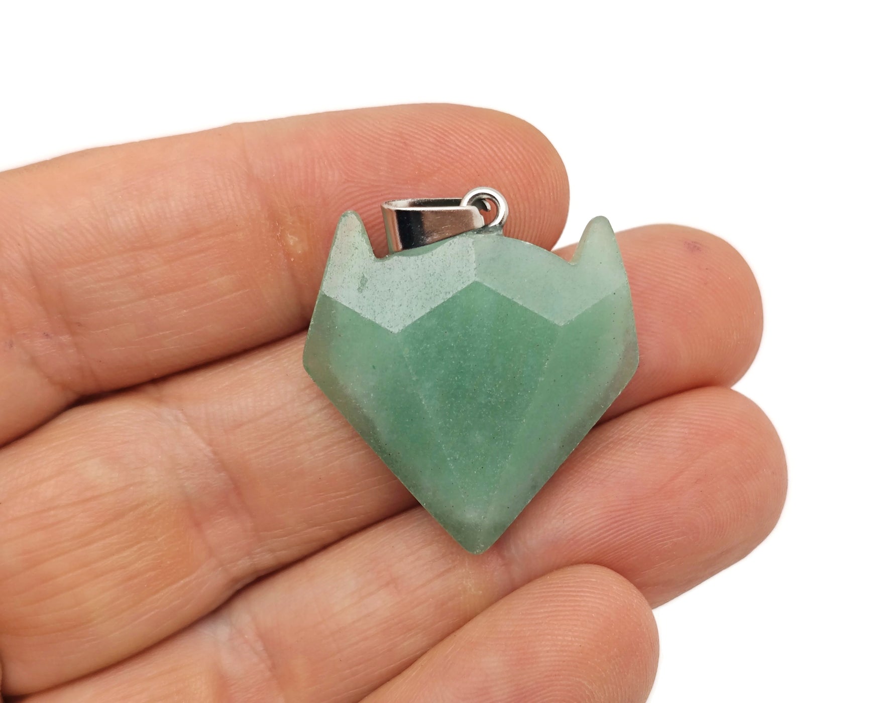 Crystal wolf head gemstone pendant from GemstoneGO, featuring a detailed wolf head design in sparkling crystal jewelry.