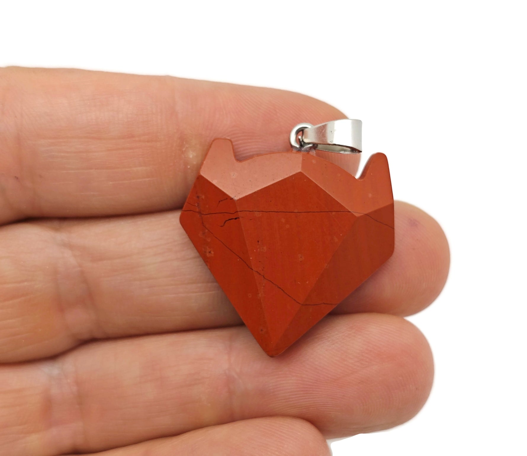 Crystal wolf head gemstone pendant from GemstoneGO, featuring a detailed wolf design in sparkling crystal jewelry style.