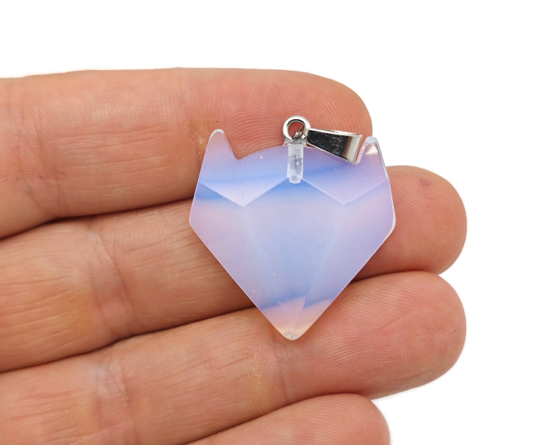 Crystal wolf head pendant from GemstoneGO featuring a detailed gemstone wolf head design in sparkling crystal jewelry.