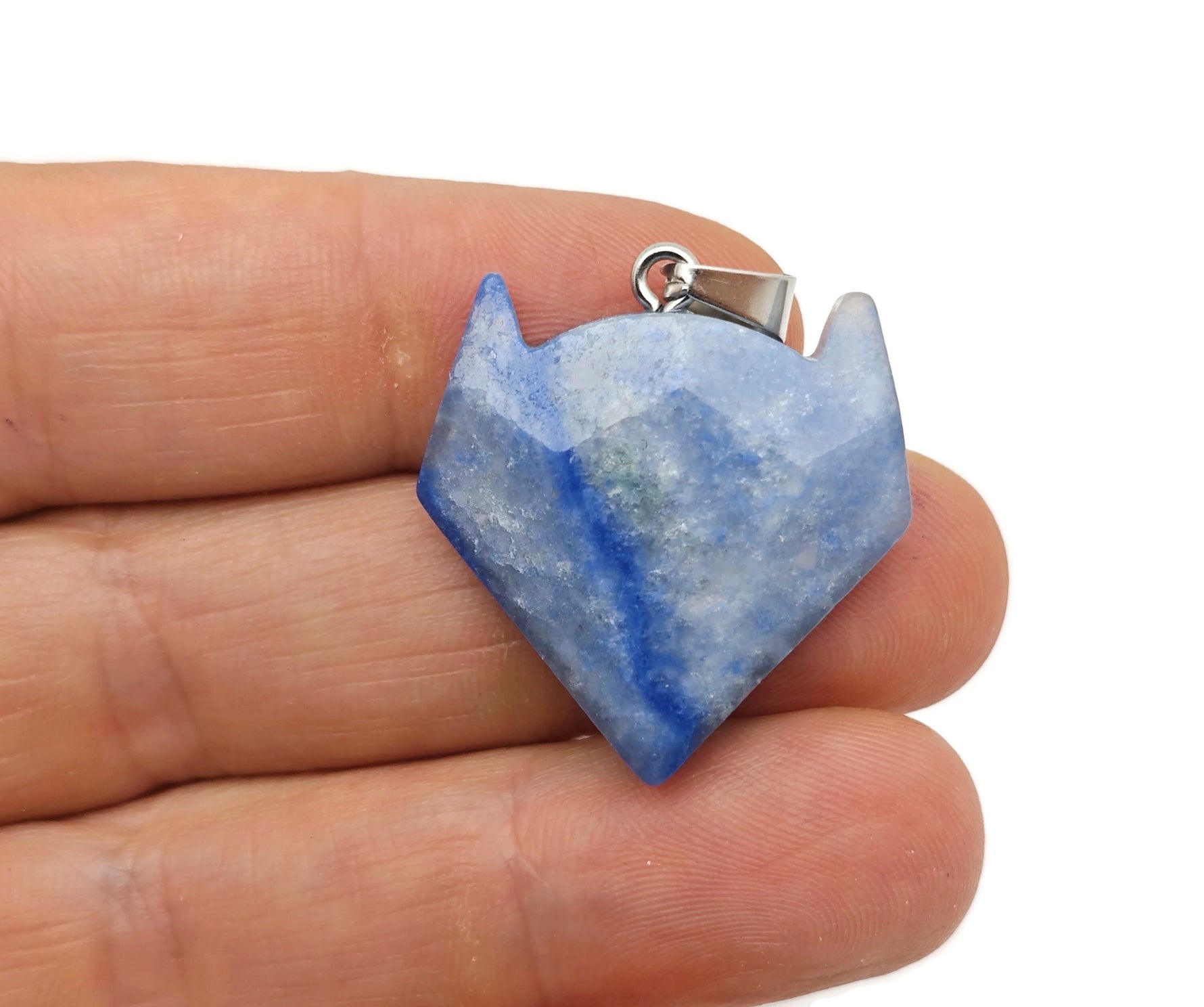 Crystal wolf head gemstone pendant from GemstoneGO featuring a detailed wolf design in shimmering crystal jewelry.