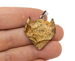 Crystal wolf head gemstone pendant showcasing a detailed wolf design in vibrant, polished crystal jewelry by GemstoneGO.