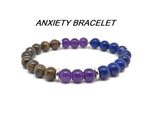 Handmade gemstone intention bracelet with colorful crystals, stretchy design for men and women, by GemstoneGO.