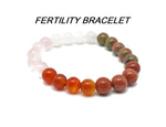 Handmade stretchy intention bracelet with colorful crystals for men and women by GemstoneGO, featuring a unique mixed gemstone design.