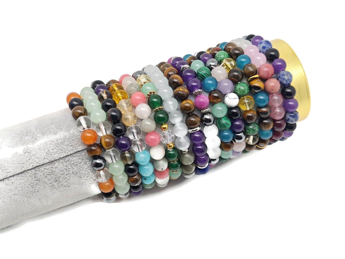 Handmade stretchy intention bracelet with colorful crystals for men and women by GemstoneGO, featuring mixed gemstone beads.
