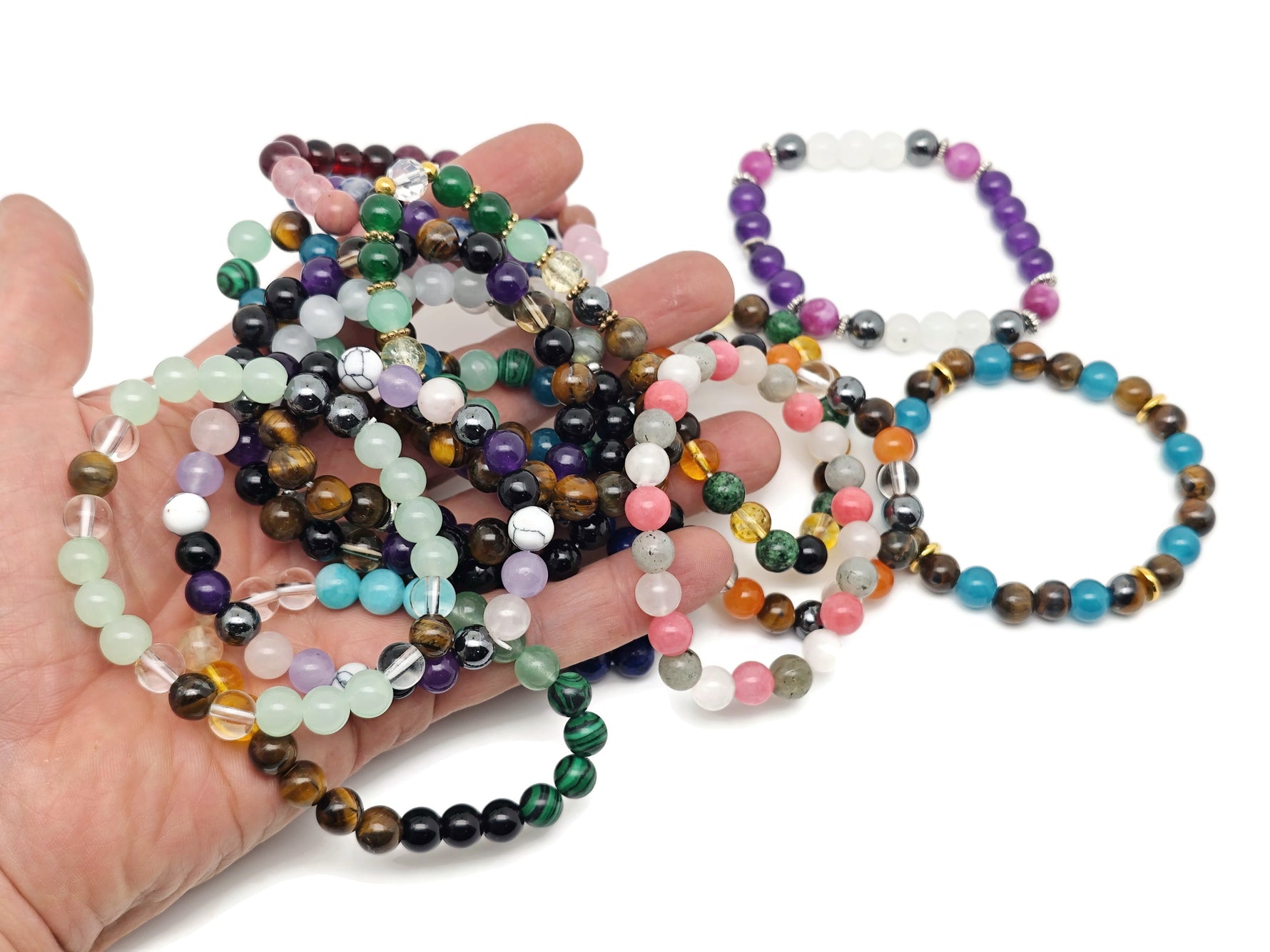 Handmade gemstone intention bracelet with colorful crystals on a stretchy band, suitable for men and women by GemstoneGO.