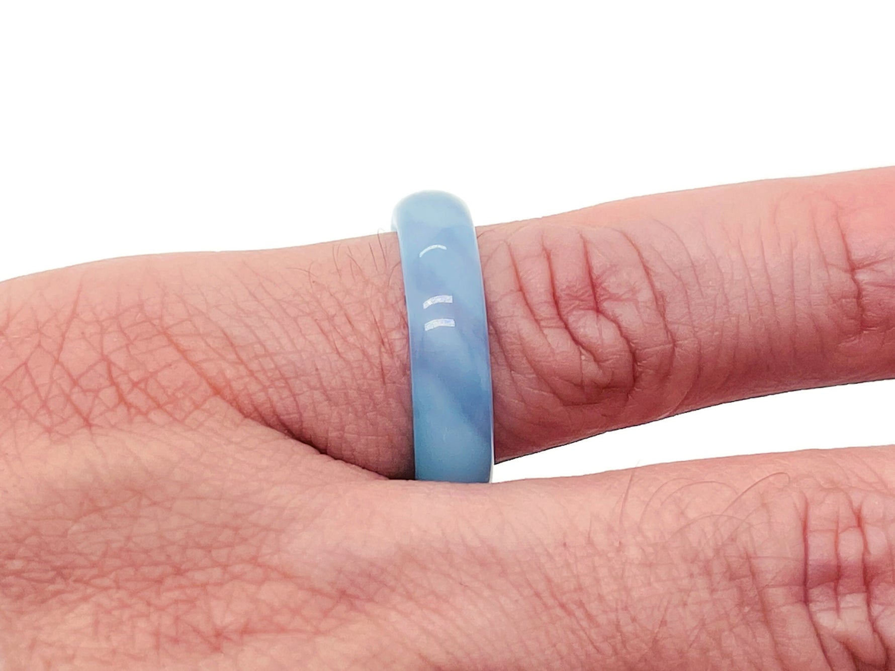 Genuine gemstone crystal ring from GemstoneGO, featuring a vibrant, polished gemstone set in a silver band for jewelry making.