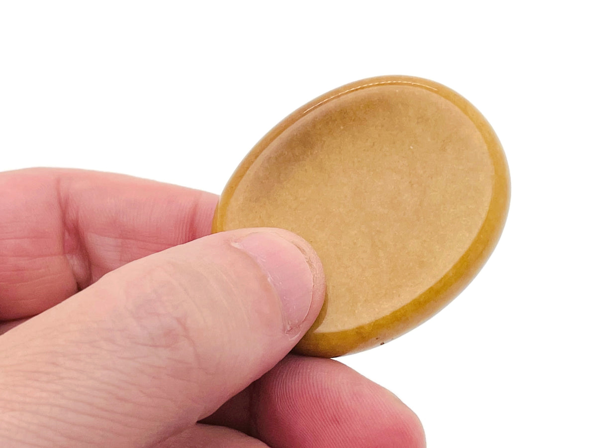 Crystal worry stone by GemstoneGO, 45x35mm soothing crystal for stress relief, featuring a smooth, polished mixed gemstone surface.
