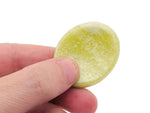 Crystal worry stone from GemstoneGO, 45x35mm soothing stress relief crystal with mixed stones in a natural, polished finish.
