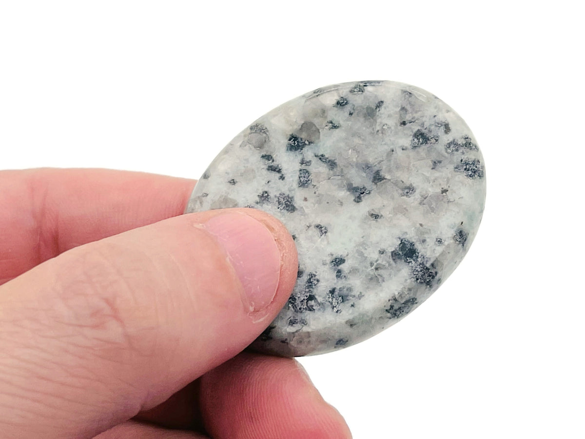 Smooth crystal worry stone from GemstoneGO, 45x35mm, featuring a calming, polished surface for stress relief and relaxation.