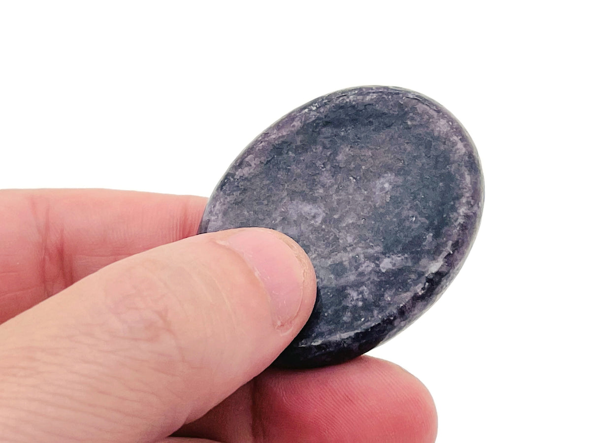 Smooth crystal worry stone from GemstoneGO, 45x35mm, featuring soothing, colorful gemstones for stress relief and relaxation.