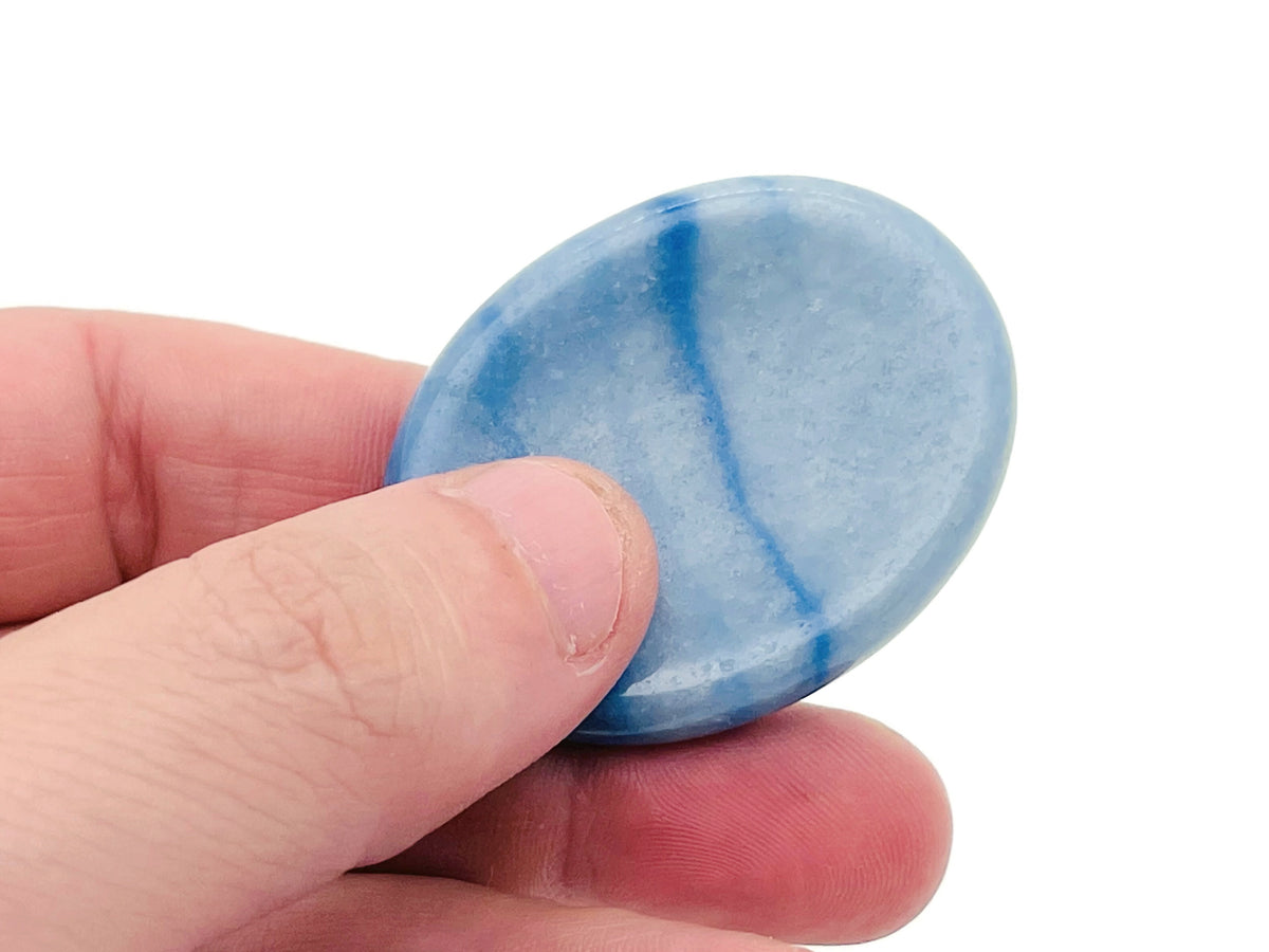 Crystal worry stone by GemstoneGO, 45x35mm soothing crystal for stress relief, with mixed gemstone colors and smooth surface.