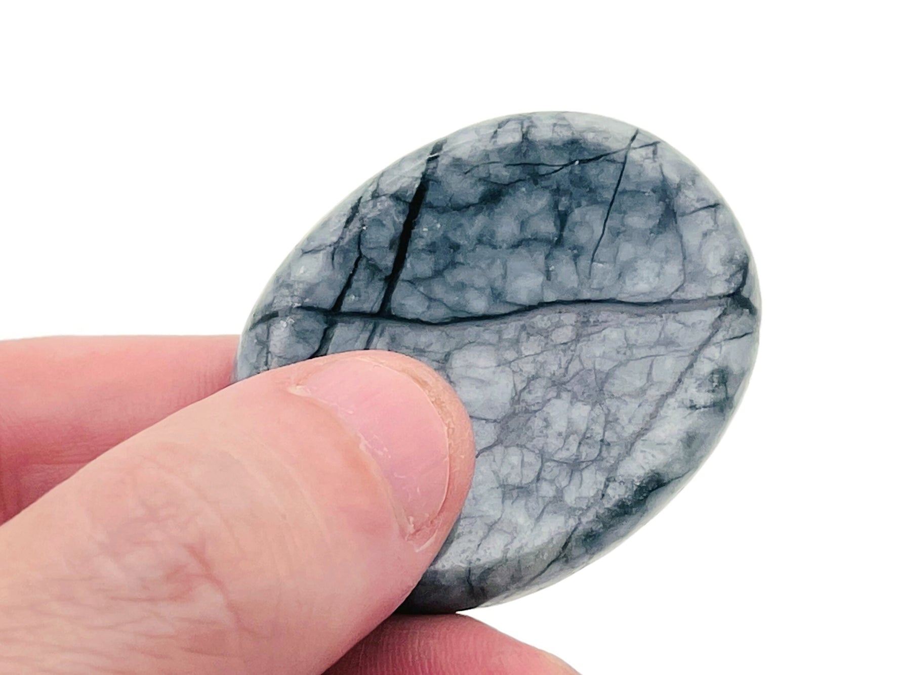 Crystal worry stone from GemstoneGO, 45x35mm, soothing stress relief crystal with mixed gemstone colors, smooth polished surface.