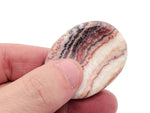 Smooth crystal worry stone from GemstoneGO, 45x35mm, featuring soothing, colorful gemstone surfaces for stress relief and relaxation.
