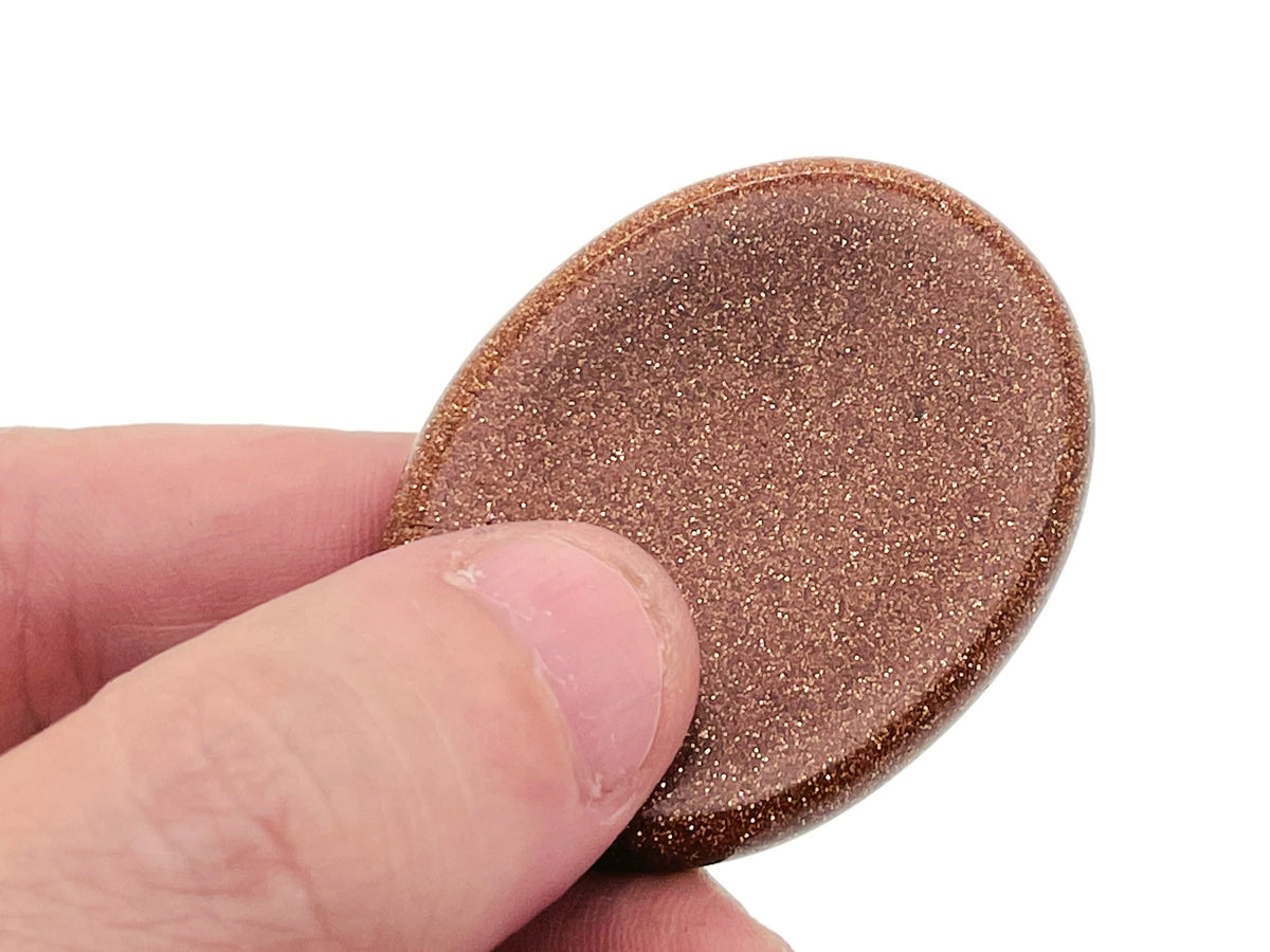 Smooth crystal worry stone from GemstoneGO, 45x35mm, featuring soothing, mixed-color gemstones for stress relief and relaxation.