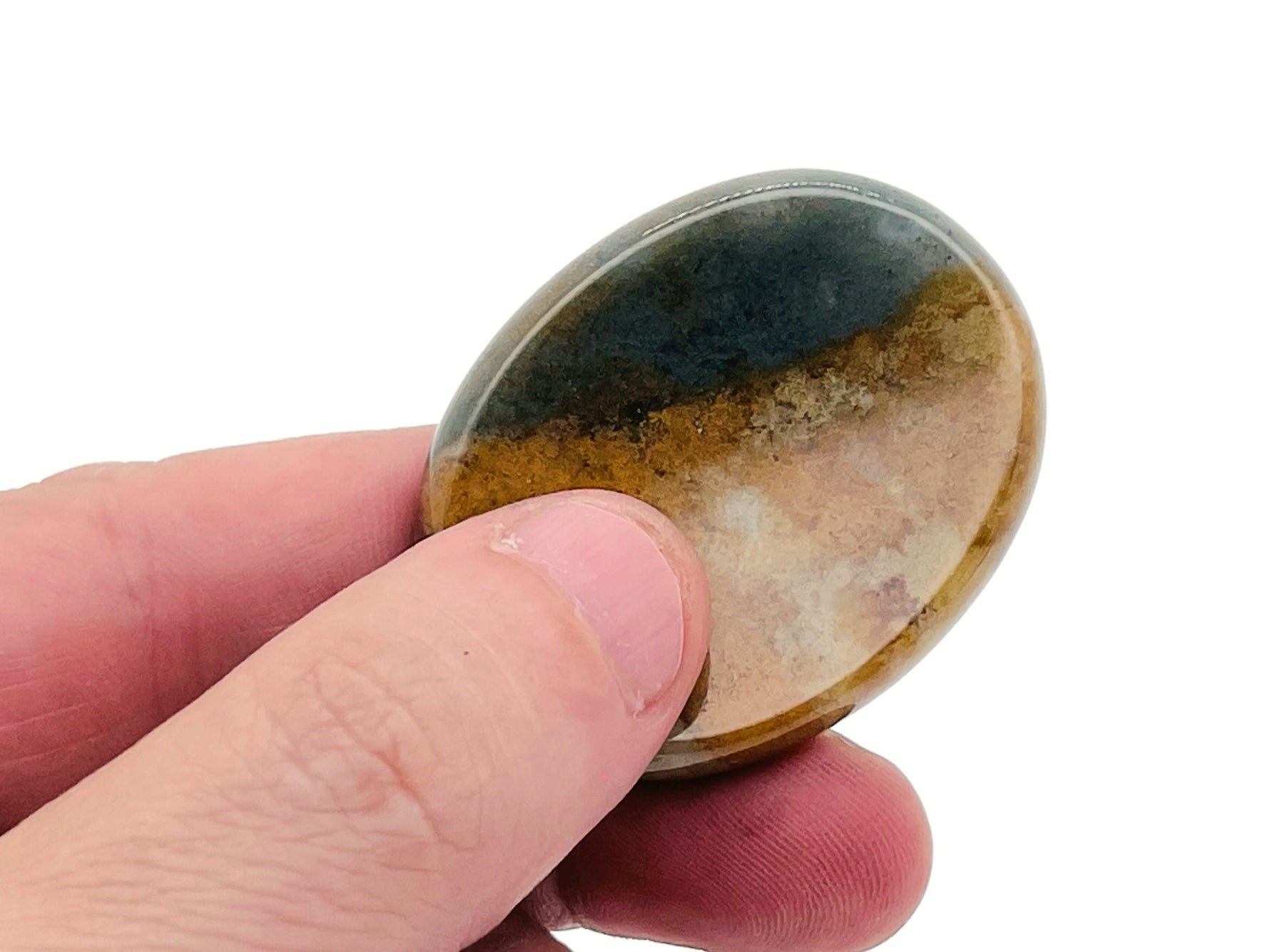 Handheld crystal worry stone from GemstoneGO, 45x35mm soothing stress relief stone with mixed gemstones for calming use.