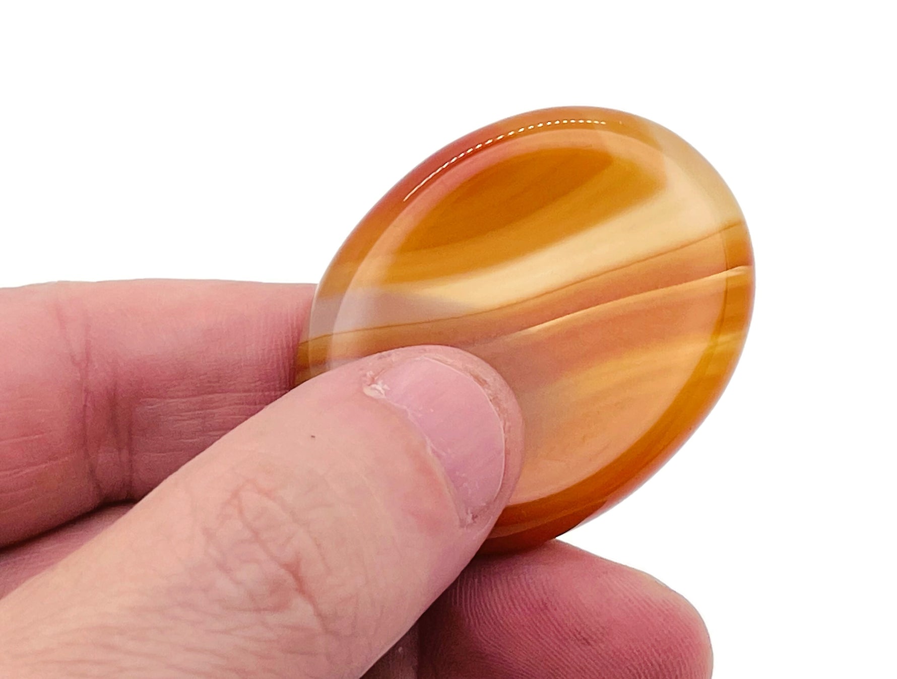 Smooth crystal worry stone from GemstoneGO, 45x35mm soothing stress relief crystal with mixed gemstone colors.
