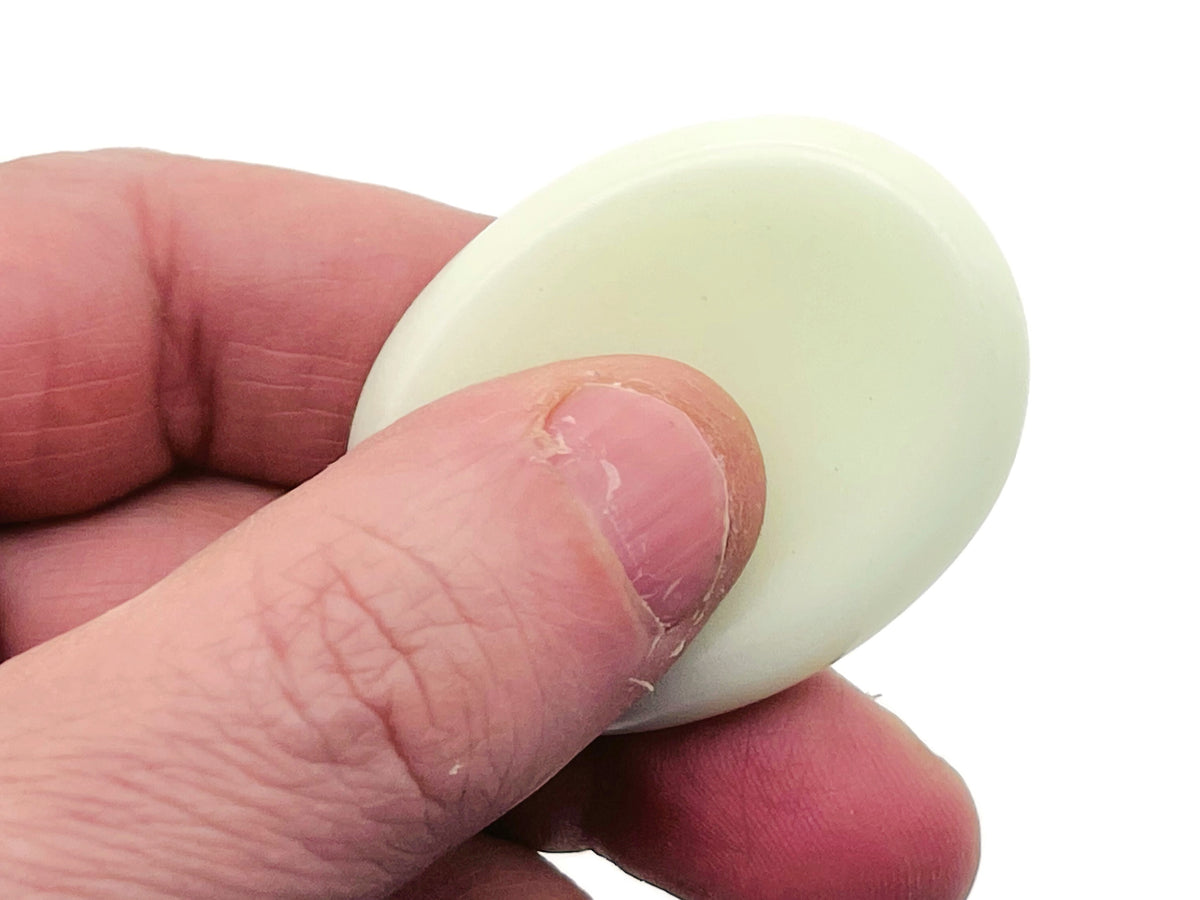 Handheld crystal worry stone from GemstoneGO, 45x35mm soothing stress relief crystal with mixed gemstone colors.