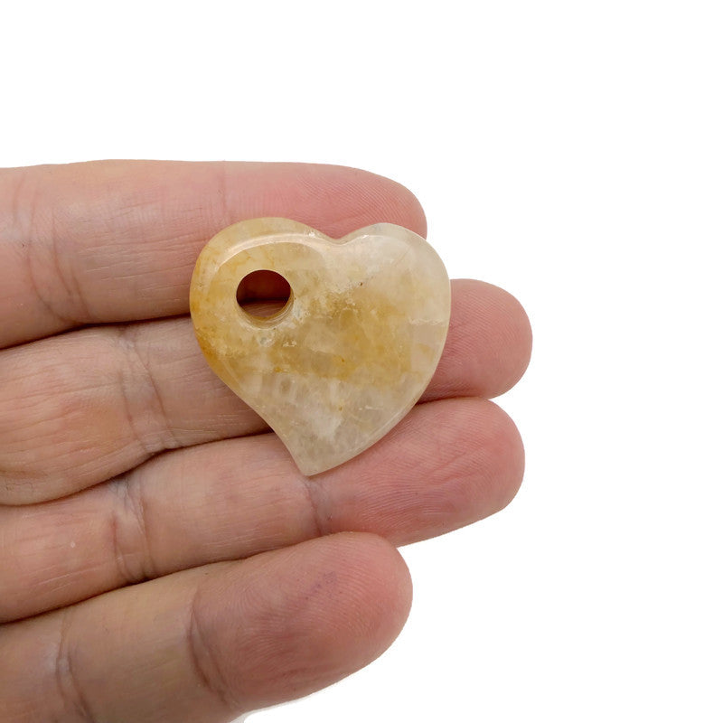 Dainty 30mm crystal heart pendant with hole, gemstoneGO's mix of sparkling crystal hearts on a white background.