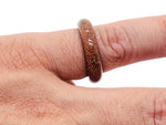 GemstoneGO crystal ring with a genuine gemstone, showcasing a sparkling gemstone set in a silver band, perfect for jewelry making.