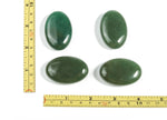 Aventurine palm gemstone spa stone, 45x35mm, smooth polished green stone for relaxation and healing.