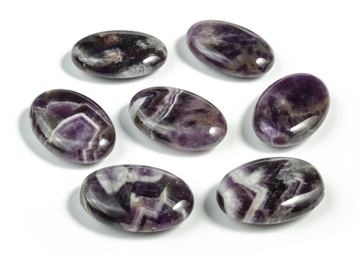 Dream Amethyst palm gemstone spa stone, 45x35mm, from GemstoneGO, showing polished purple amethyst with natural gemstone patterns.