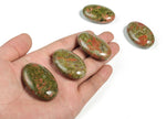 Unakite palm gemstone spa stone, 45x35mm, smooth and polished for healing and relaxation purposes.
