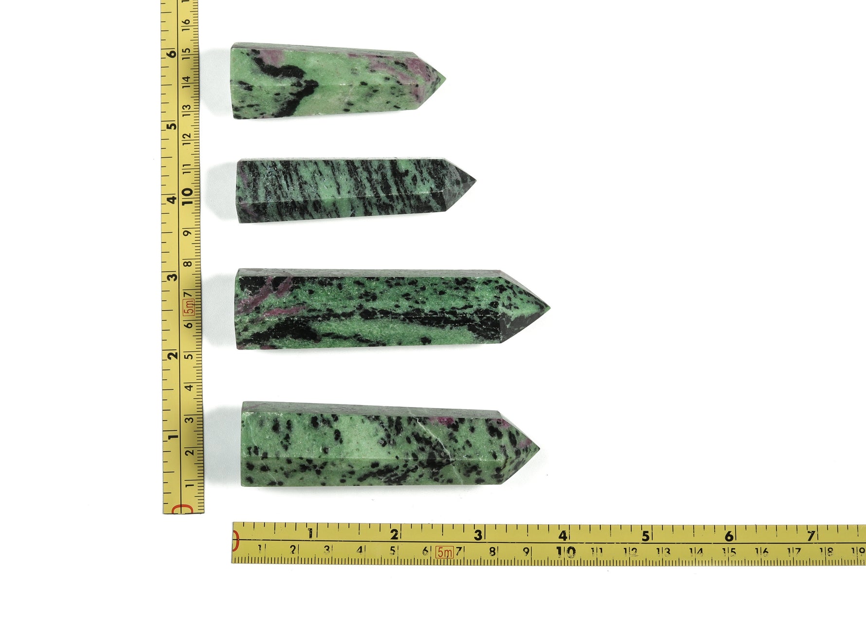 Ruby Zoisite obelisk tower crystal from GemstoneGO, showcasing a vibrant mixed red and green gemstone with smooth polished surfaces.