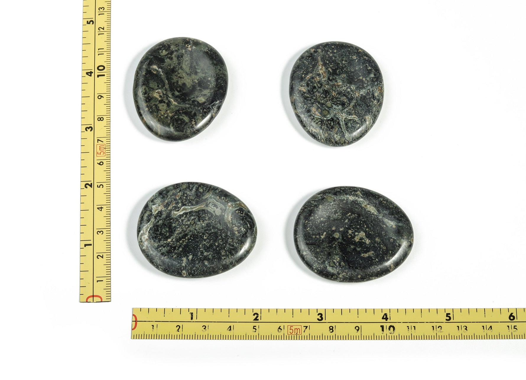 Kambaba Jasper worry stone from GemstoneGO, 3.8x4.6cm, featuring soothing green and black swirling patterns on polished crystal.