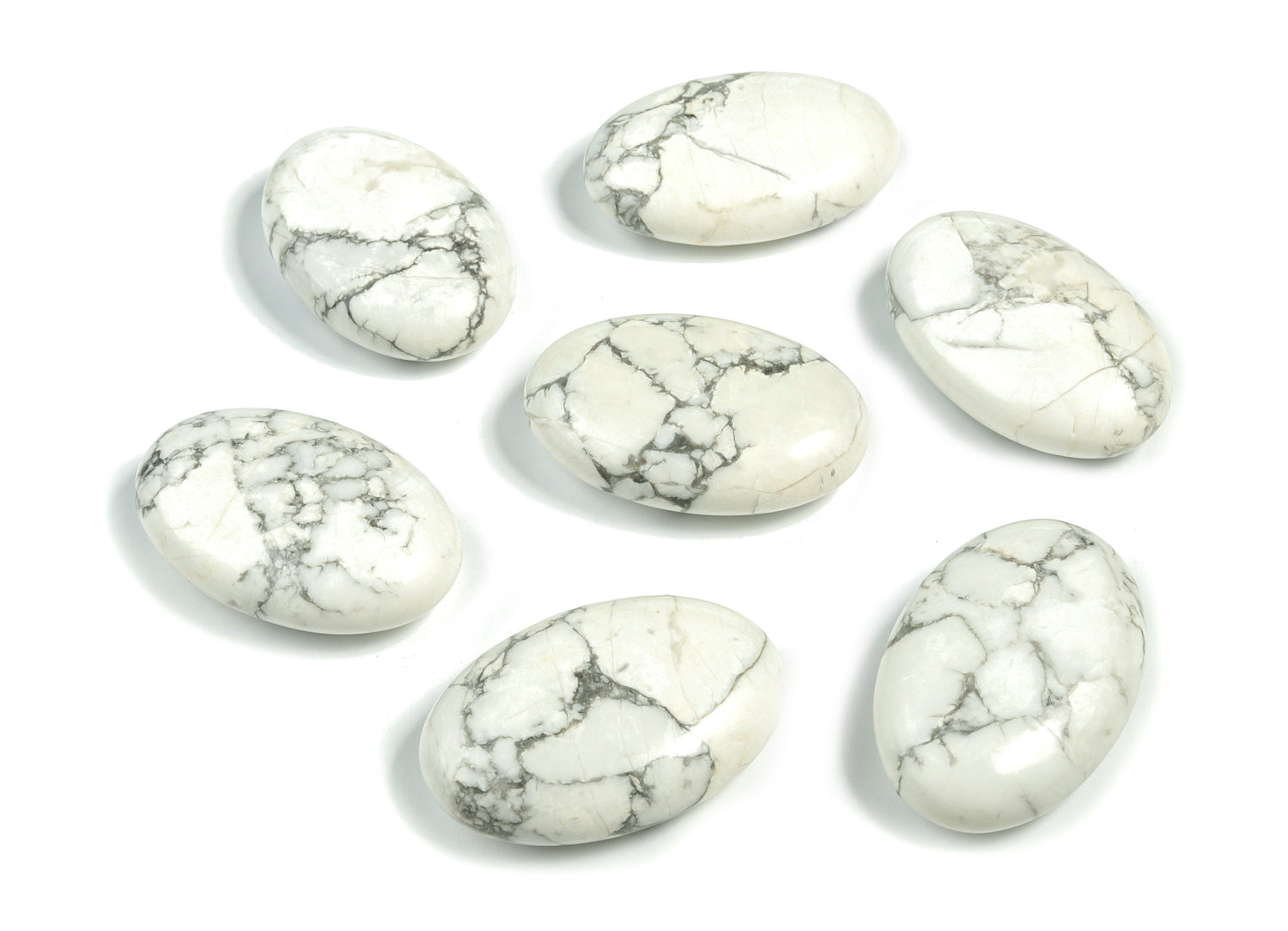 Howlite palm gemstone spa stone, 45x35mm, smooth polished surface, natural white and gray veining, ideal for relaxation and meditation.