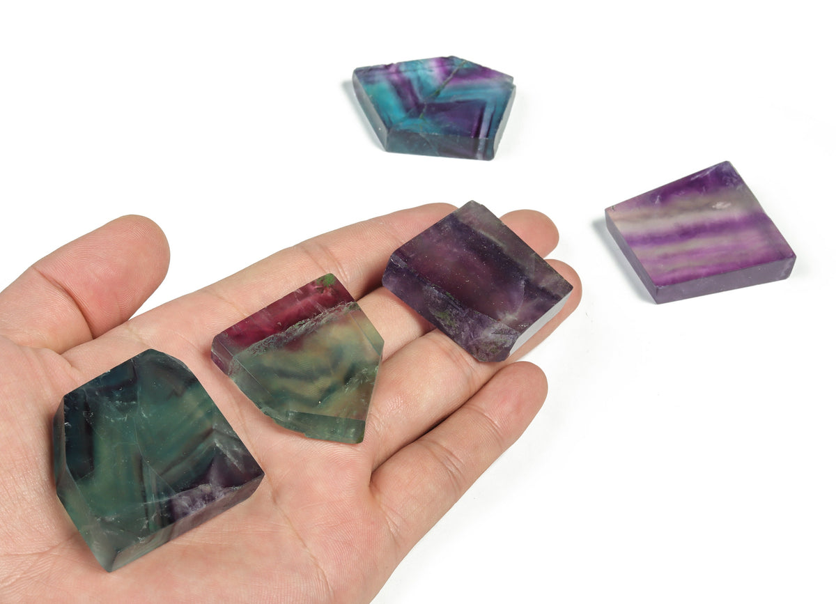 Fluorite flat gemstone slab from GemstoneGO, showcasing vibrant green and purple mineral layers, polished surface with natural patterns.
