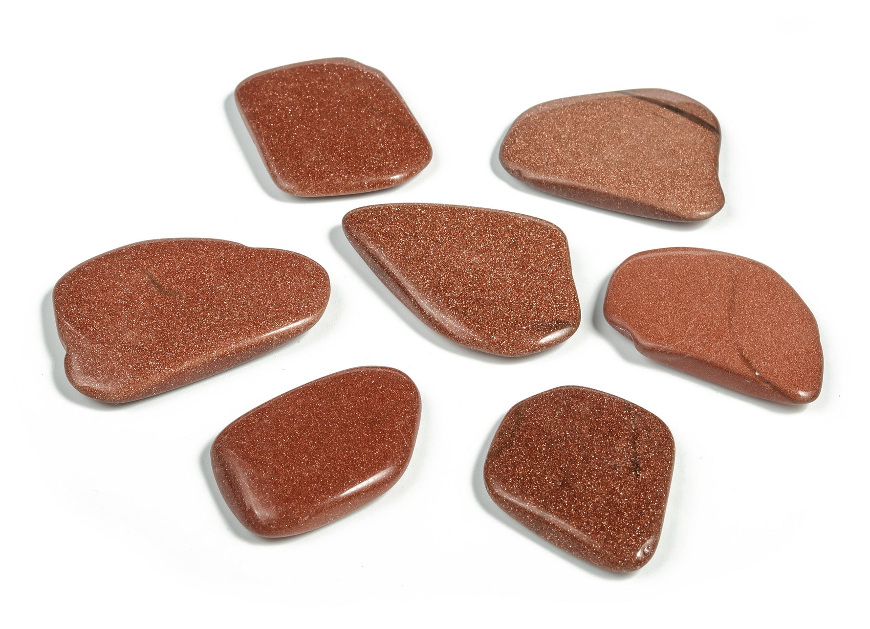 Goldstone flat gemstone slab from GemstoneGO, showcasing a smooth, polished crystal surface with a rich, sparkling golden hue.
