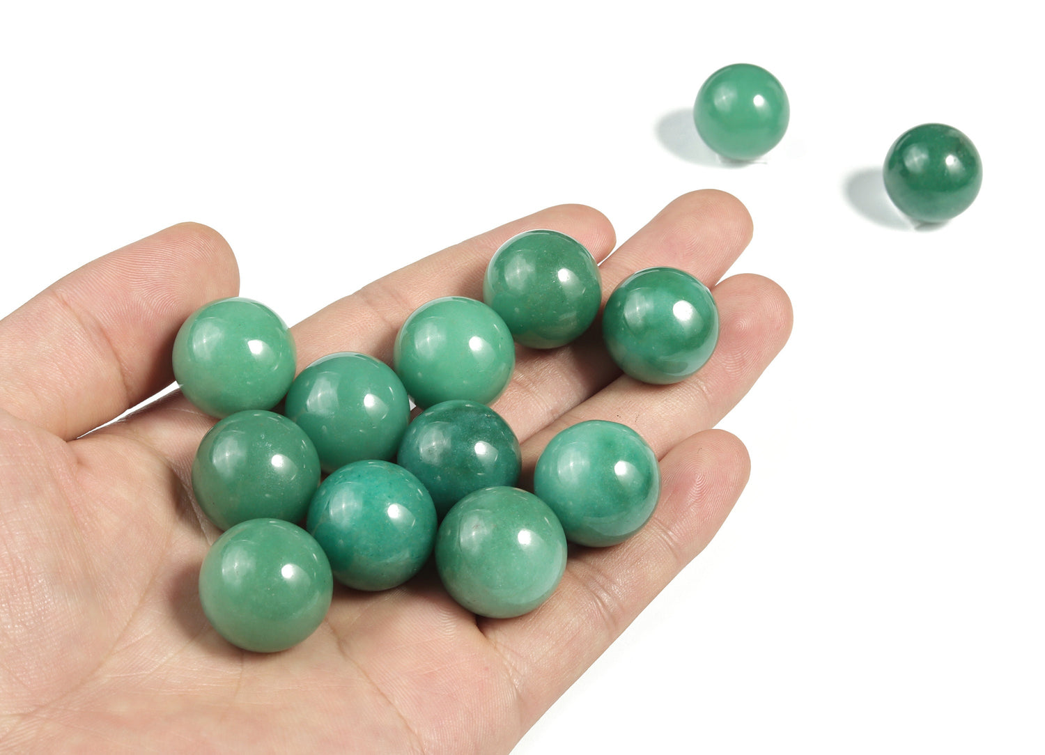 20mm Aventurine gemstone sphere, crystal ball from GemstoneGO, showcasing the green, polished, rounded stone on a neutral background.