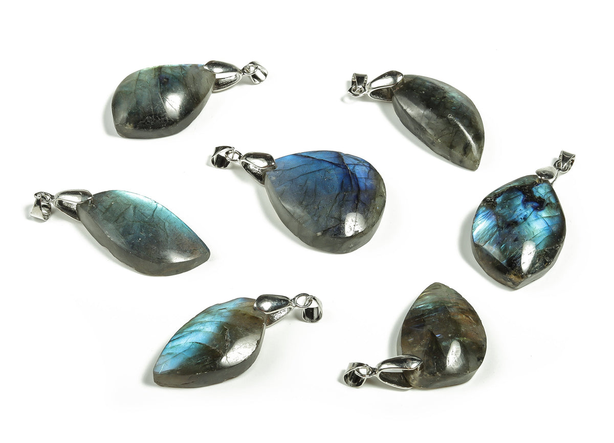 Labradorite crystal pendant from GemstoneGO, showcasing iridescent gemstone with metal bail for jewelry making.