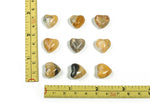 Pink puffy heart-shaped Crazy Lace Agate gemstone from Mexico, 15x15x9mm, showcasing vibrant patterns and natural stone details.