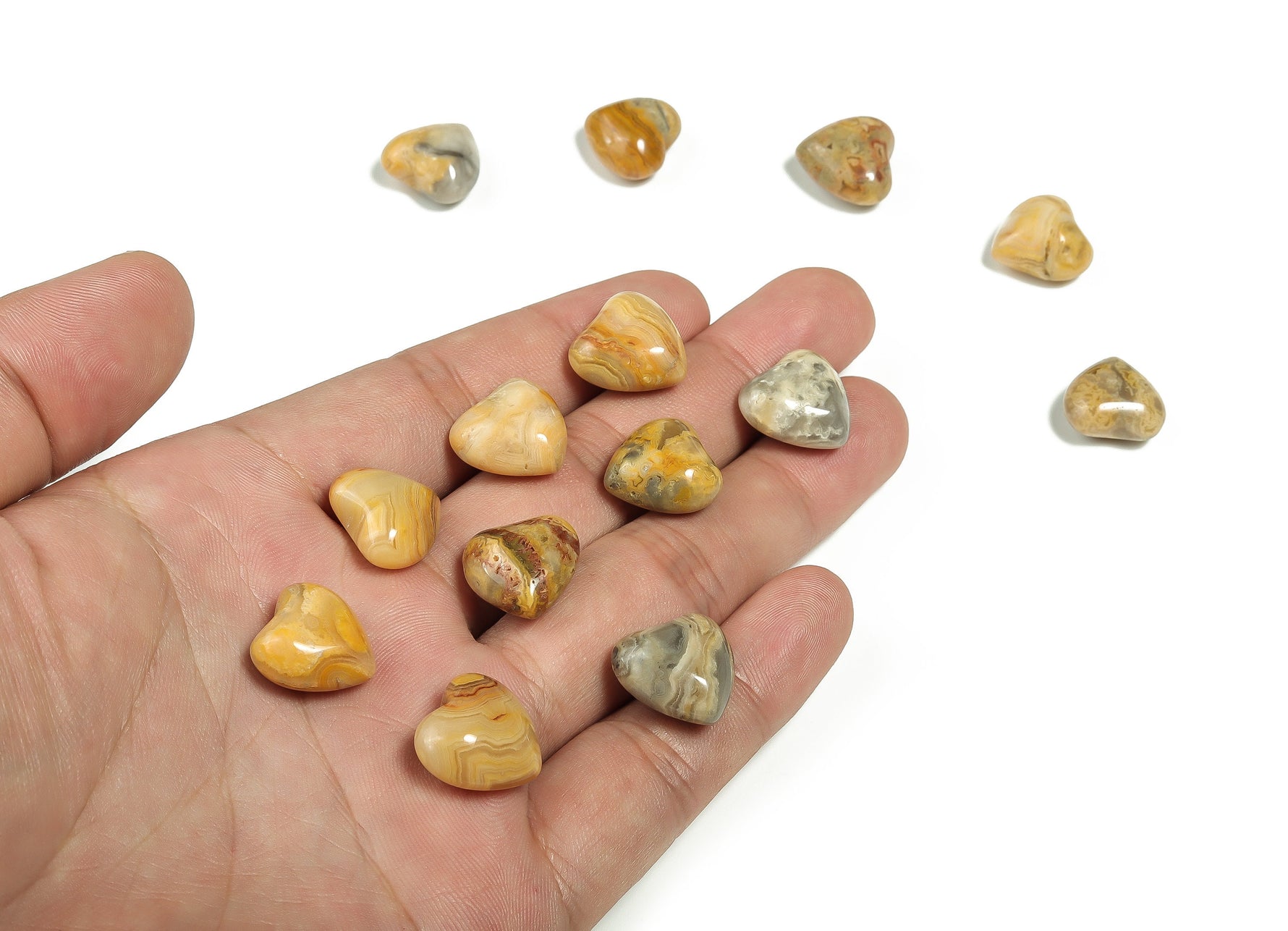 Puffy heart-shaped Crazy Lace Agate gemstone from Mexico, 15x15x9mm, featuring vibrant layered patterns and natural stone textures.