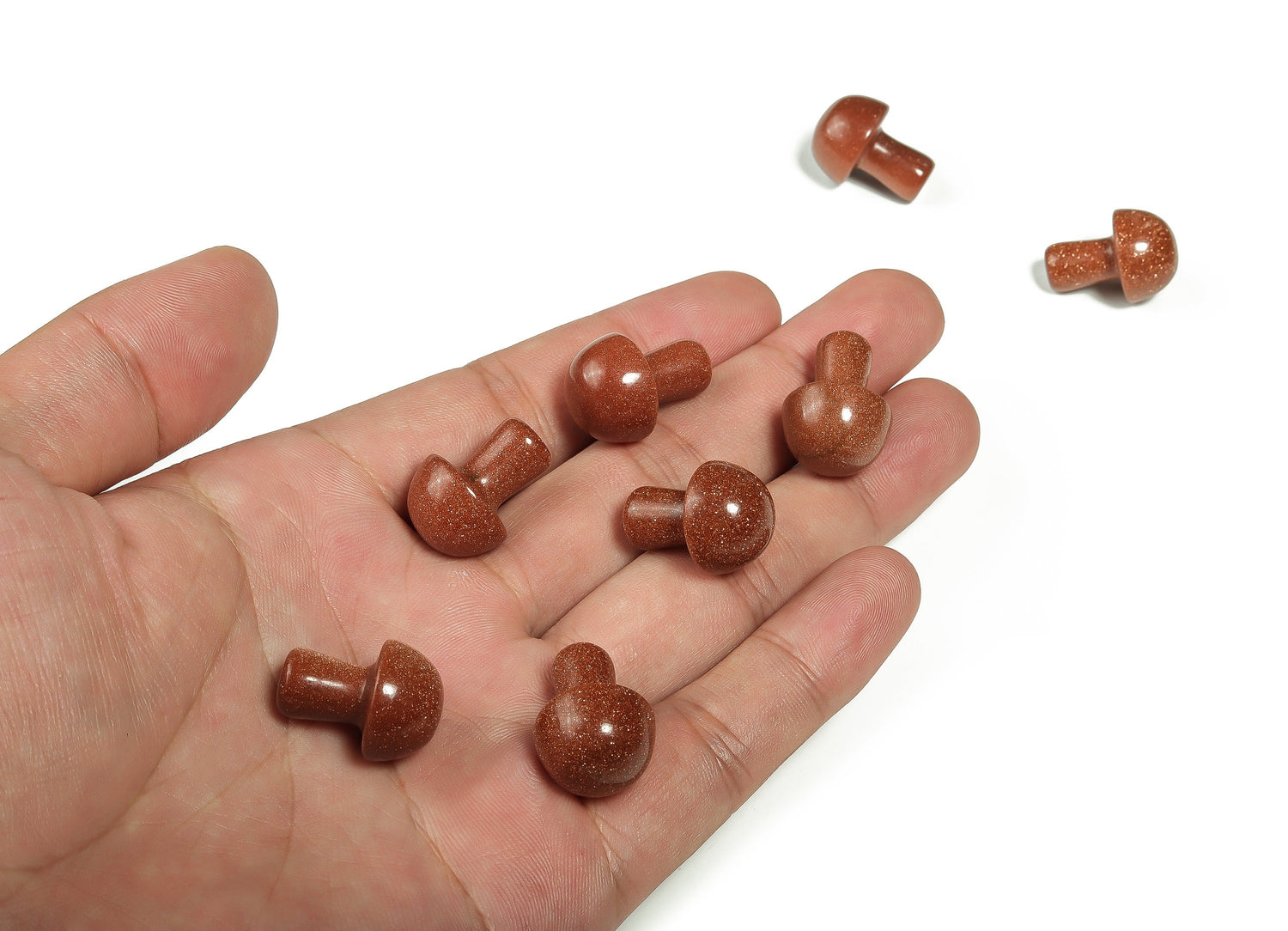 Goldstone mushroom carved gemstone pendant, 20mm, from GemstoneGO, showcasing a smooth, rounded shape with intricate mushroom carving details.