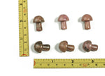 20mm Rhodonite mushroom carved gemstone from GemstoneGO, showcasing a smooth, polished pink and black stone with natural patterns.
