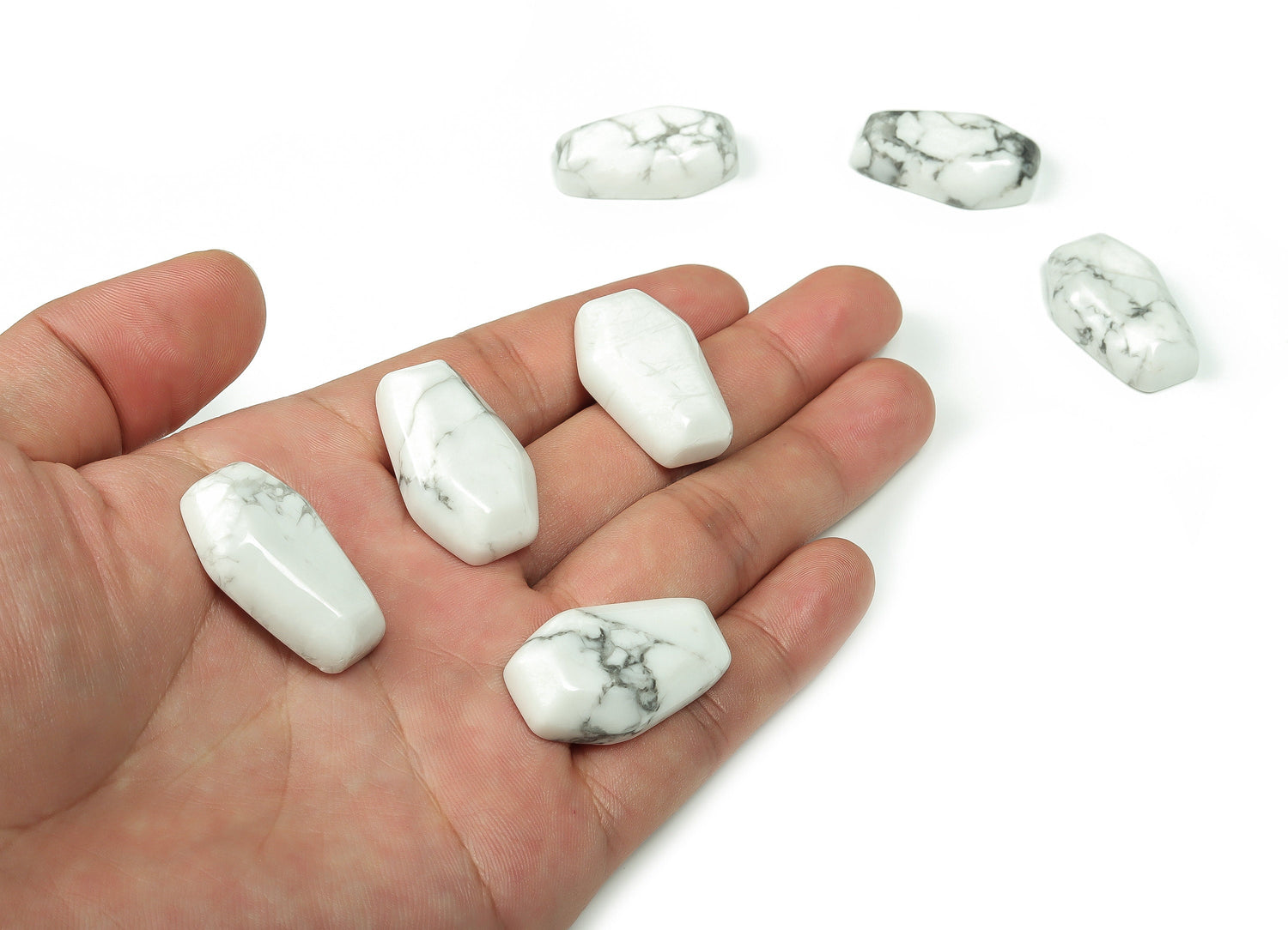 Howlite coffin-shaped crystal cabochon, 30mm gemstone carving by GemstoneGO showcasing smooth polished surface and natural white veining.