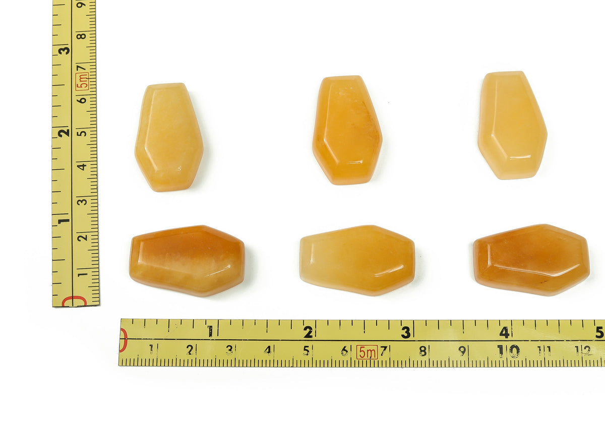 Yellow jade coffin crystal carving, 30mm gemstone with intricate details, displayed against a neutral background.