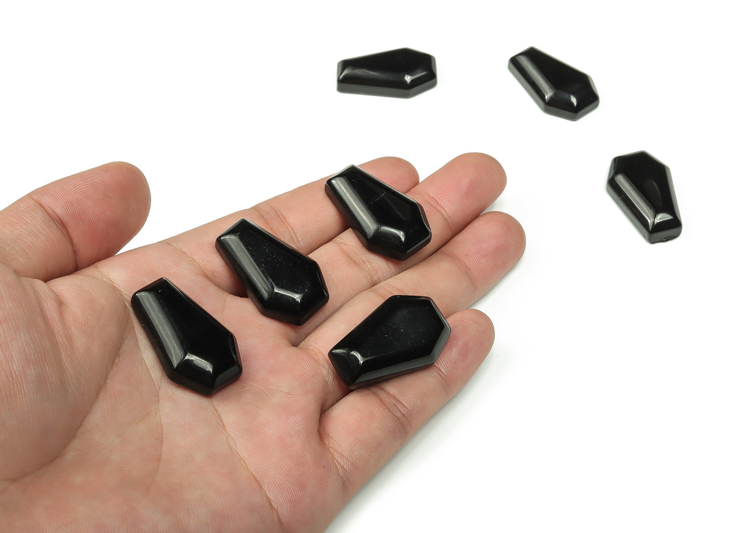 Obsidian coffin-shaped crystal cabochon with detailed carving, 30mm gemstone from GemstoneGO.