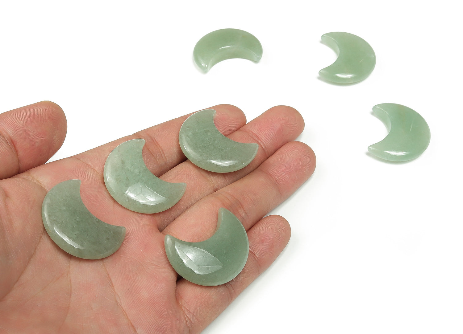 Aventurine gemstone moon pendant, 30mm, from GemstoneGO, showing a smooth, polished green aventurine lunar-shaped stone.