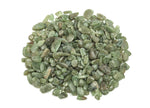 Green Apatite crystal chips in semi-tumbled 7-12mm stones, shown in bulk with vibrant green color and natural crystal texture.