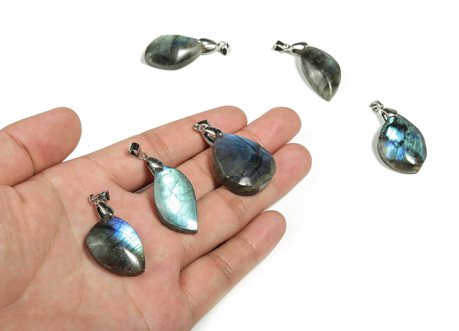 Labradorite crystal pendant from GemstoneGO, featuring a polished, iridescent gemstone ready for jewelry making.