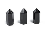 Dark obsidian obelisk tower crystal, 35mm gemstone sculpture with natural black stone features, by GemstoneGO.