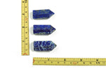 Lapis Lazuli obelisk tower crystal sculpture, 35mm, from GemstoneGO, showcasing deep blue stone with gold flecks and polished surface.