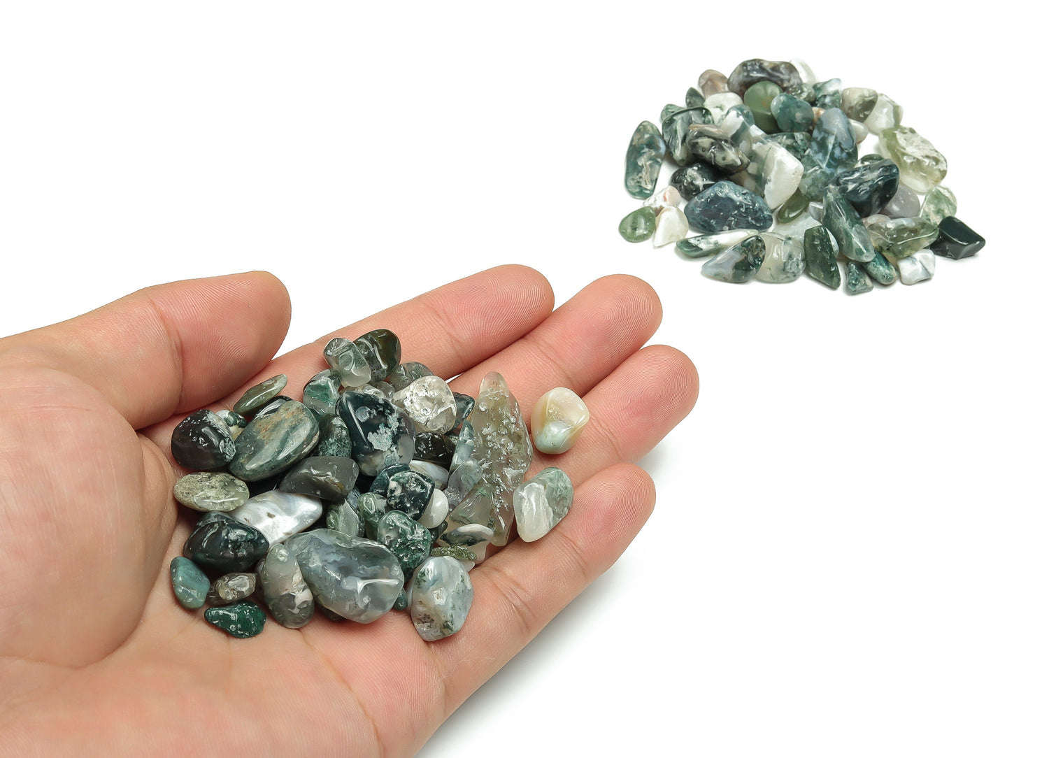 Assorted moss agate crystal chips in 7-12mm semi-tumbled stones, showcasing green, brown, and intricate natural patterns.