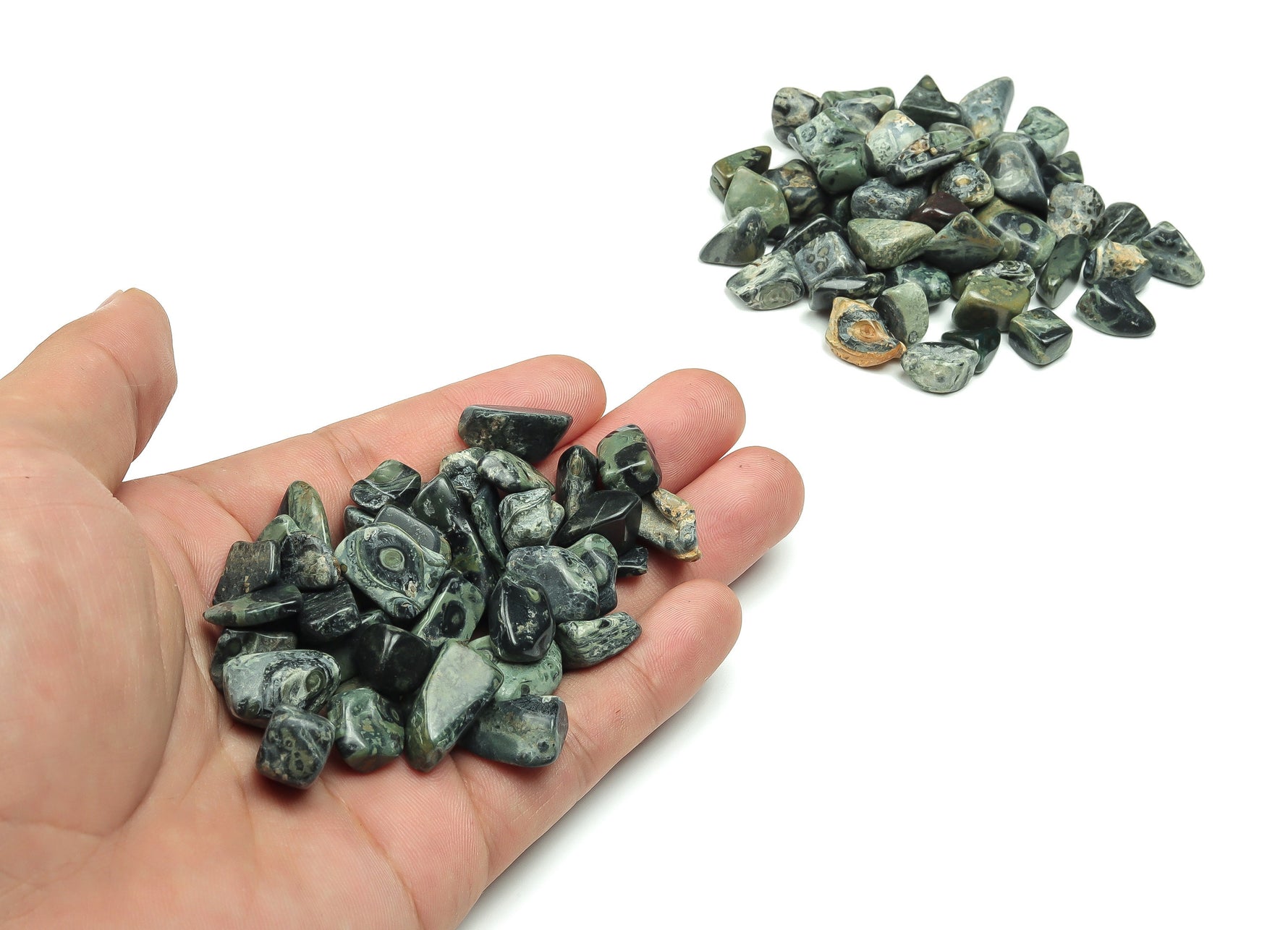 Kambaba Jasper crystal chips in 7-12mm semi-tumbled stones, bulk gemstone from GemstoneGO, showcasing green and black swirling patterns.