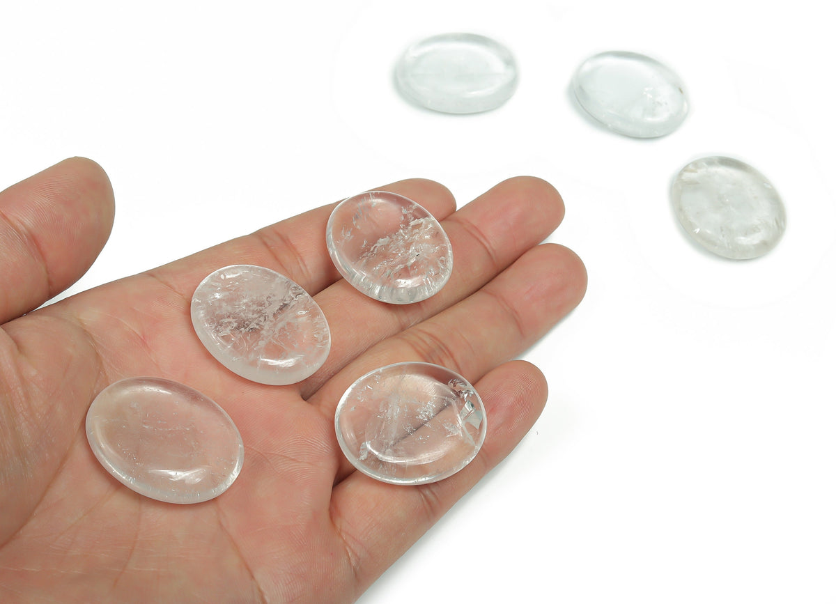Clear quartz flat gemstone slab, 30x25x7 mm, showing polished surface and natural crystal patterns from GemstoneGO.